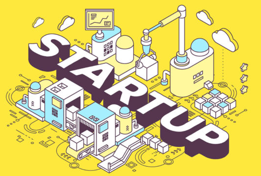 Mechanisms of a factory with the word startup on a yellow background