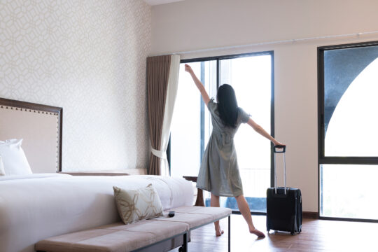 girl stretching in hotel room